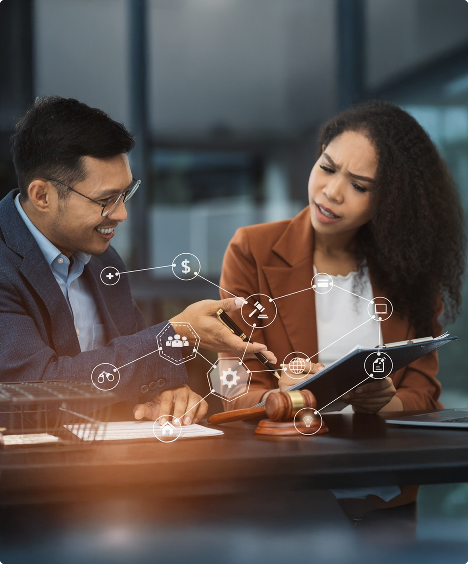 Two executives discussing legal and financial tech solutions with overlay icons
