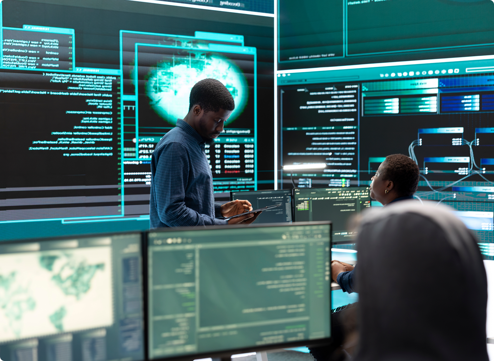 Cybersecurity monitoring operations center with data screens