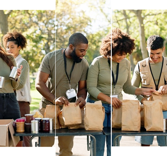 Volunteers packing food donation bags outdoors