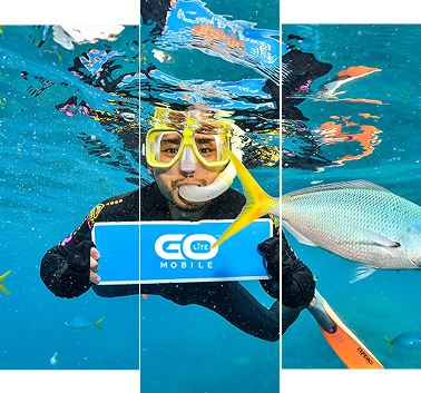 Scuba diver holding GoLite Mobile sign under water highlighting telecom ESG and conservation model